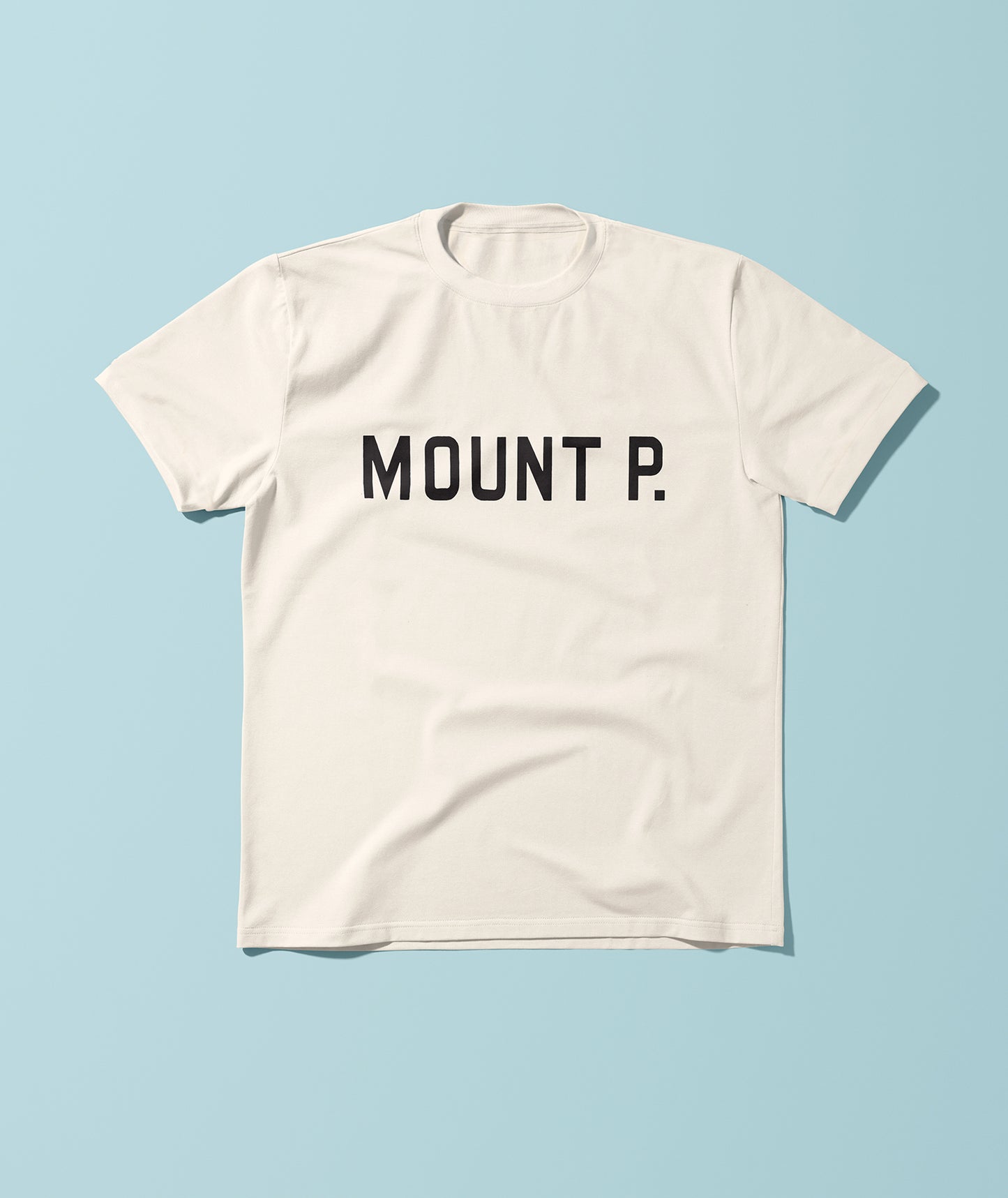 A white, short-sleeved crew neck t-shirt with the text 'MOUNT P' printed in black on the front.