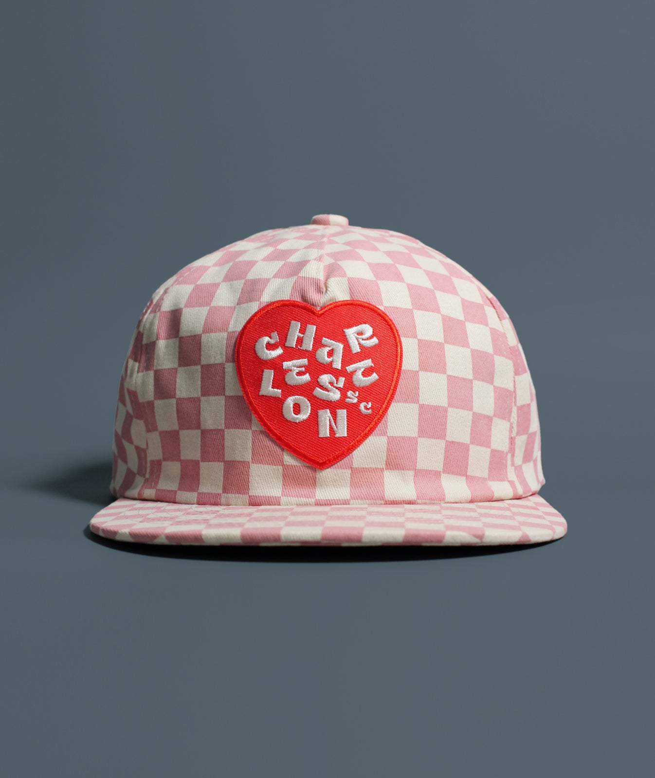 Pink and white checkered hat with red heart Charleston patch