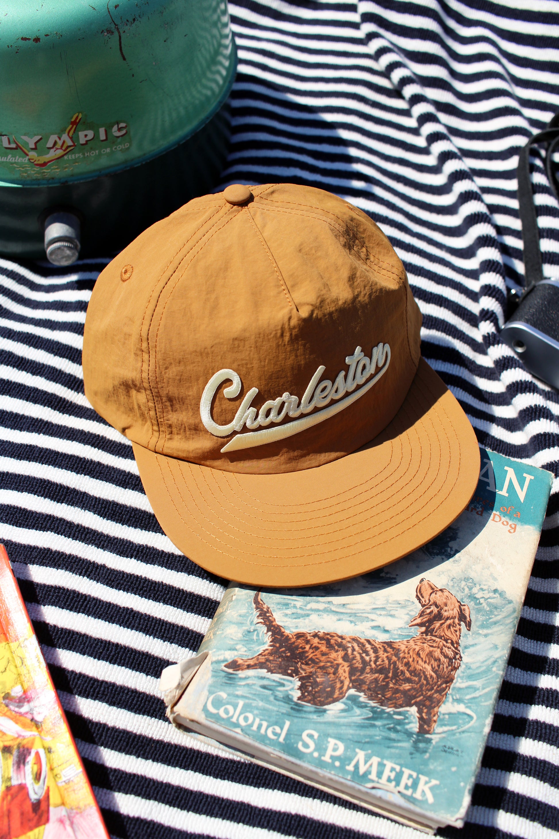 Gold cap with 'Charleston' text