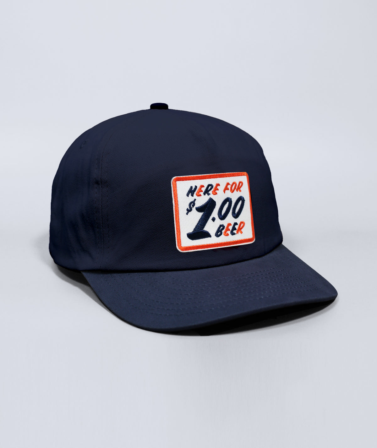 Charleston Riverdogs hat. Navy blue with patch that says Here for Dollar Beer.