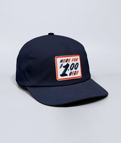 Charleston Riverdogs hat. Navy blue with patch that says Here for Dollar Beer.