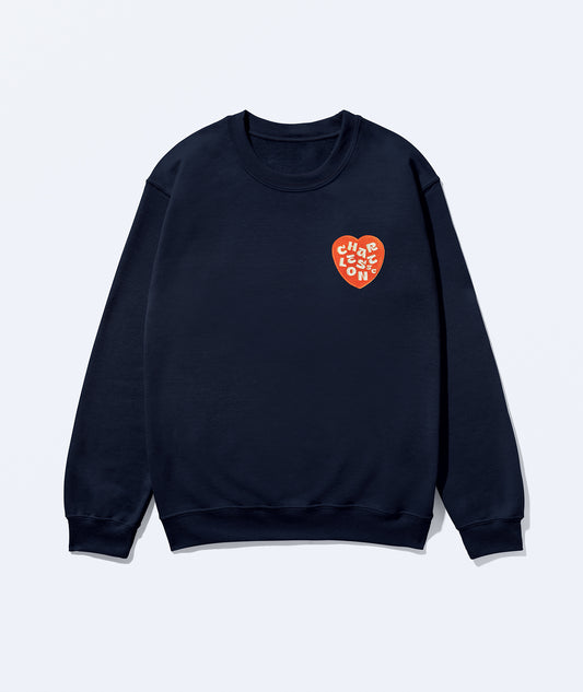 Charleston sweatshirt. Navy sweatshirt with a red heart-shaped Charleston  logo on a light gray background