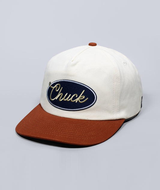 Charleston Hat. White and brown hat with Chuck patch