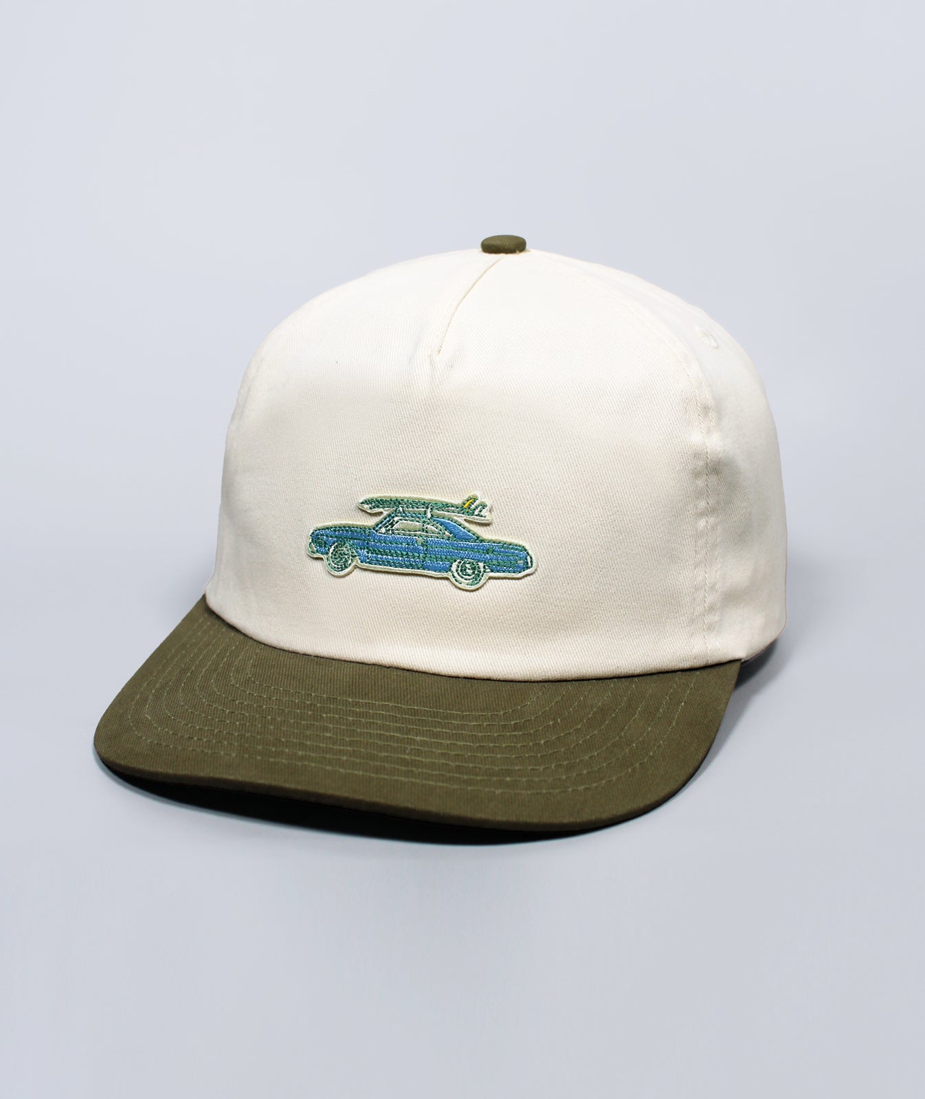 Cap with a logo on a light gray background