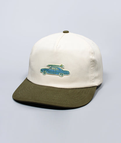 Cap with a logo on a light gray background
